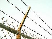 fence_prison_trial_jail_security_free.jpg